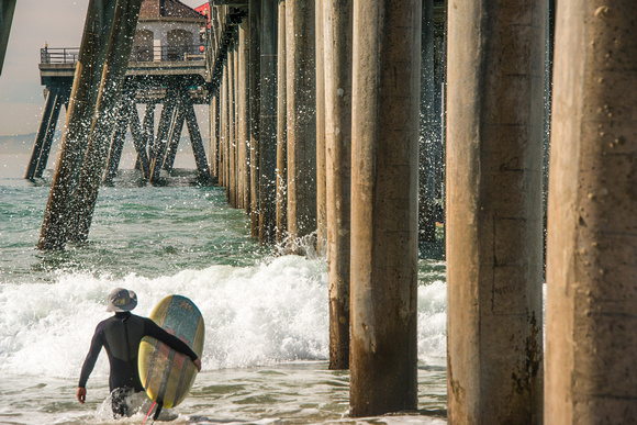 Surfer At The Huntington Beach Pier
